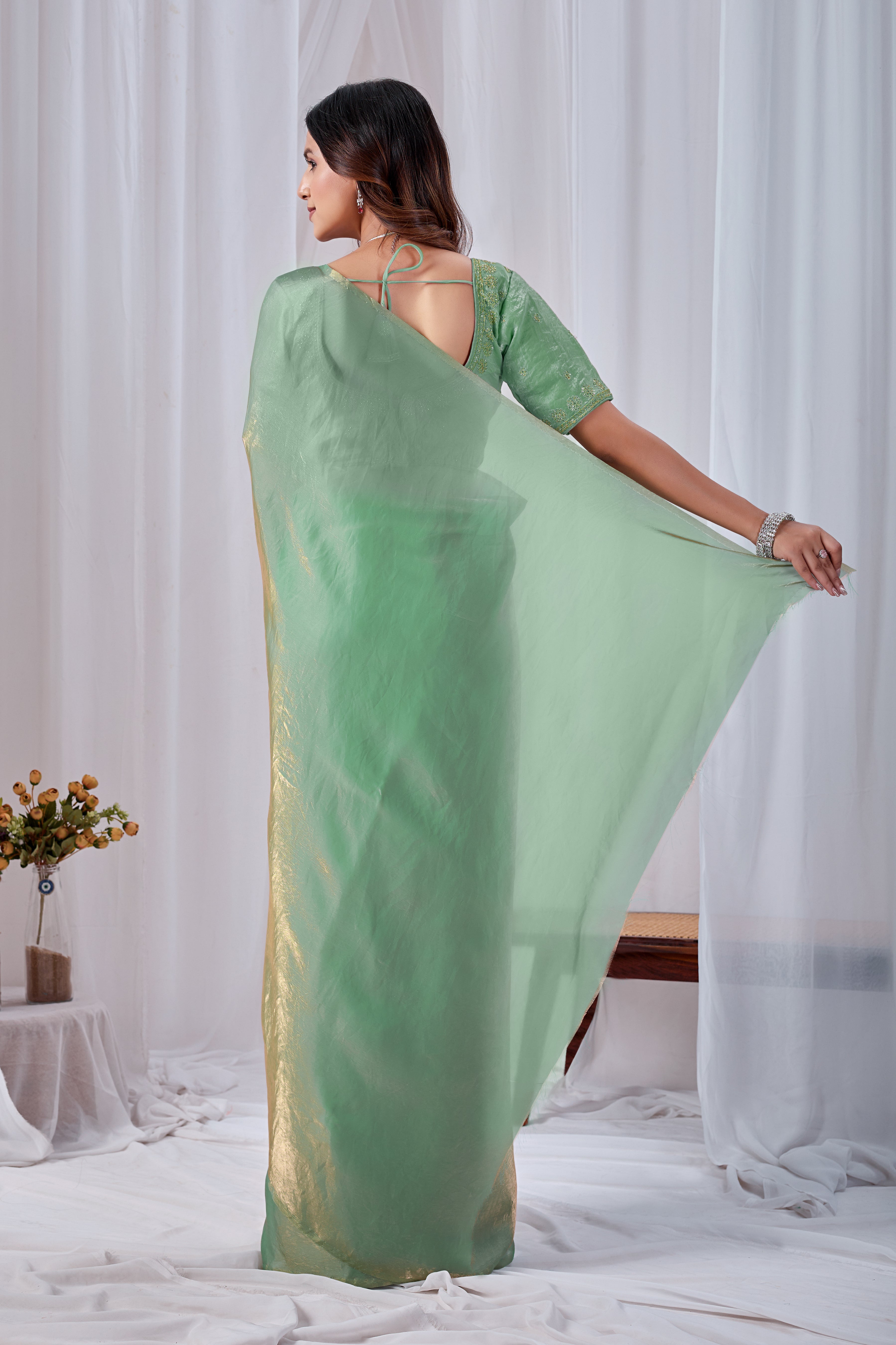 Luminous Rama Green Tissue Silk Saree with Embroidered Blouse