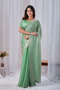 Luminous Rama Green Tissue Silk Saree with Embroidered Blouse
