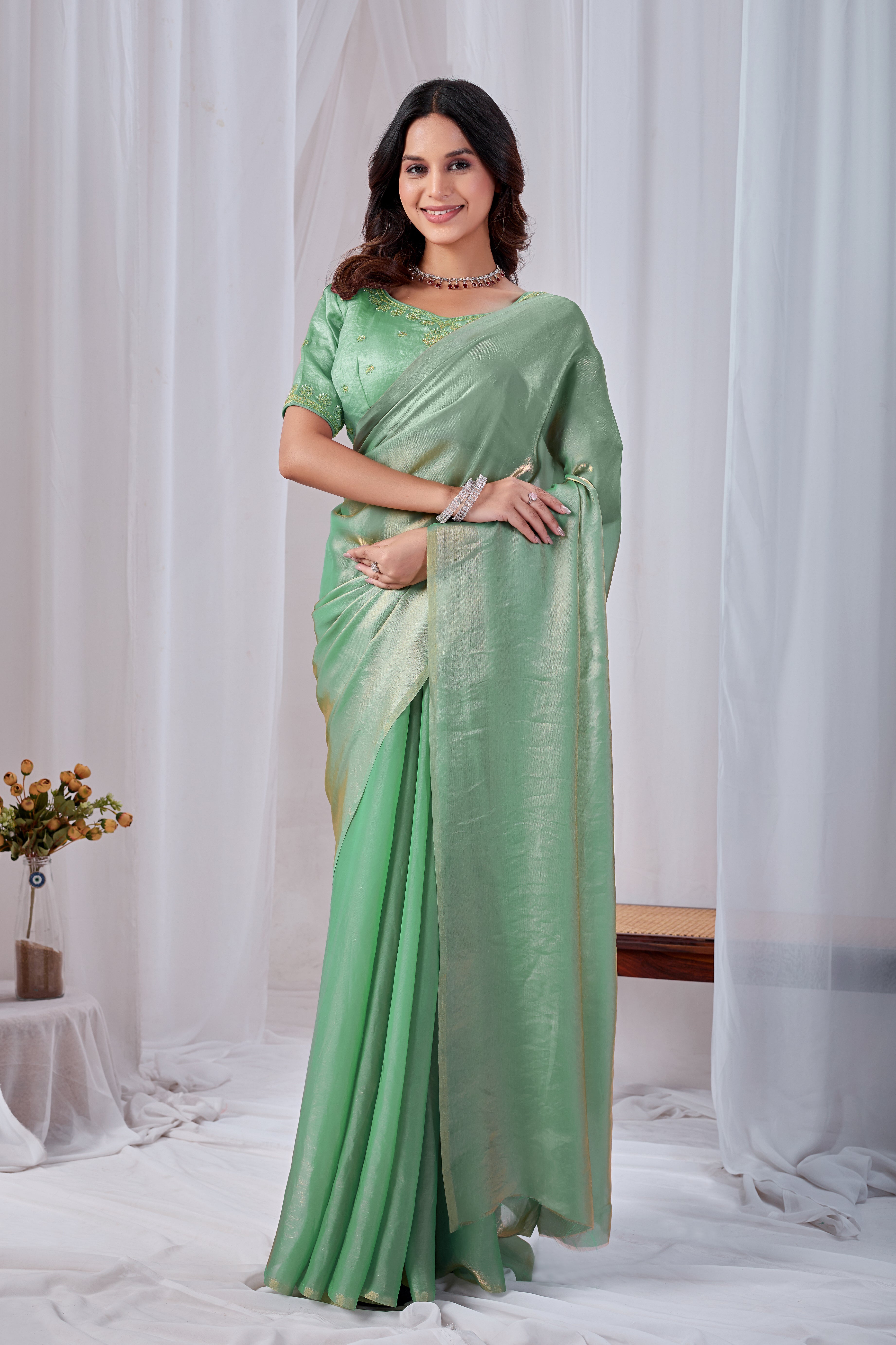 Luminous Rama Green Tissue Silk Saree with Embroidered Blouse
