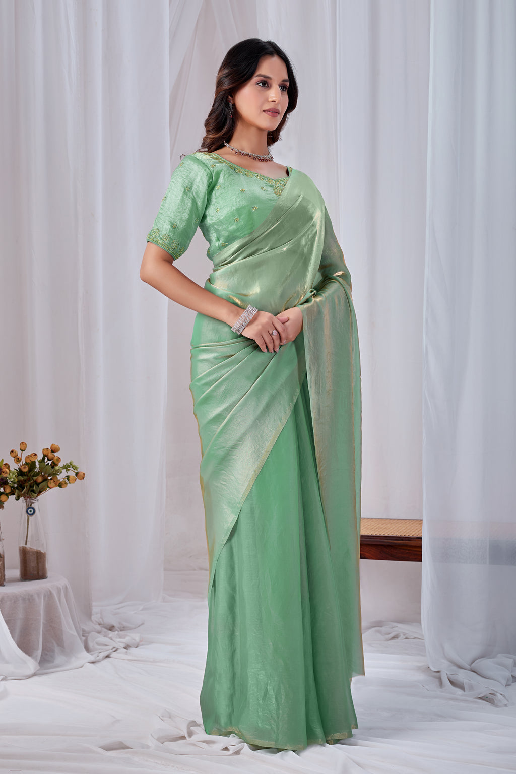 Luminous Rama Green Tissue Silk Saree with Embroidered Blouse