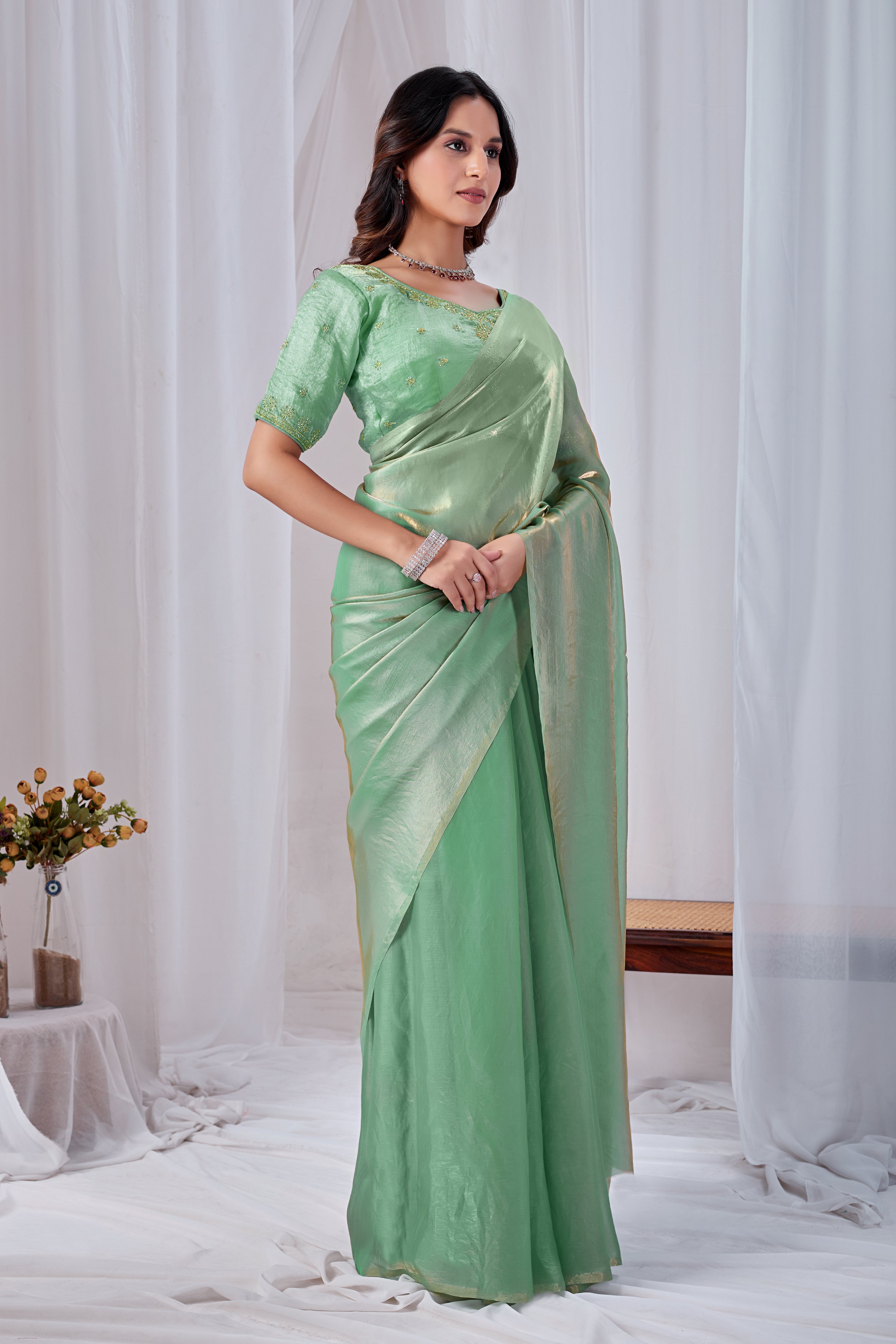 Luminous Rama Green Tissue Silk Saree with Embroidered Blouse