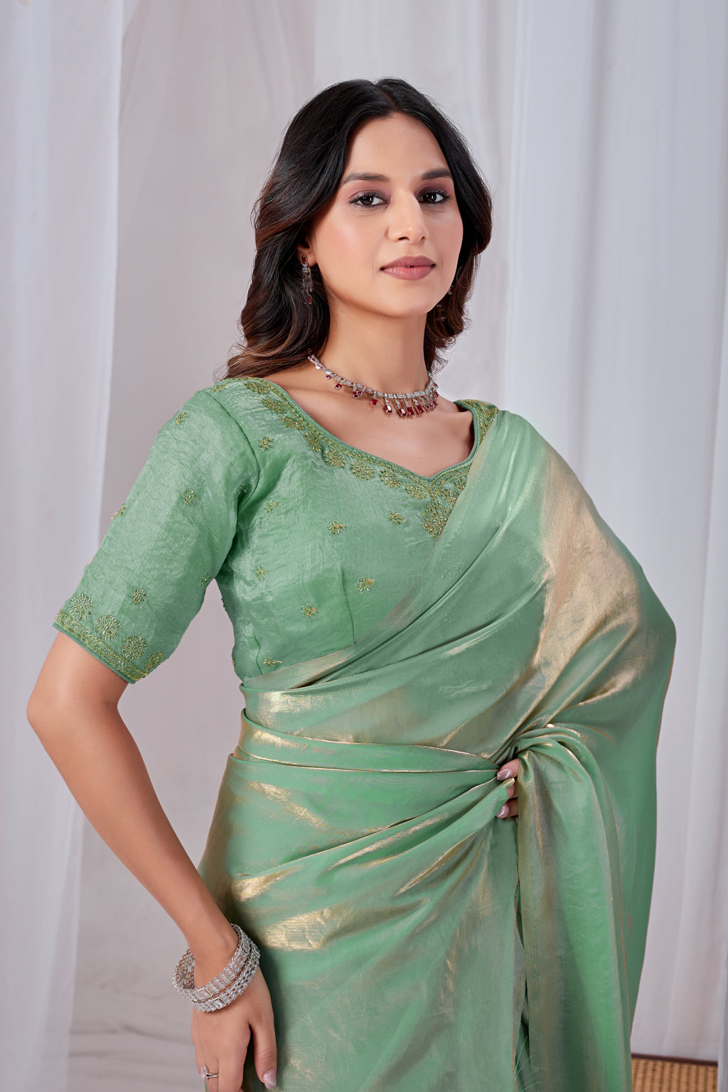 Luminous Rama Green Tissue Silk Saree with Embroidered Blouse