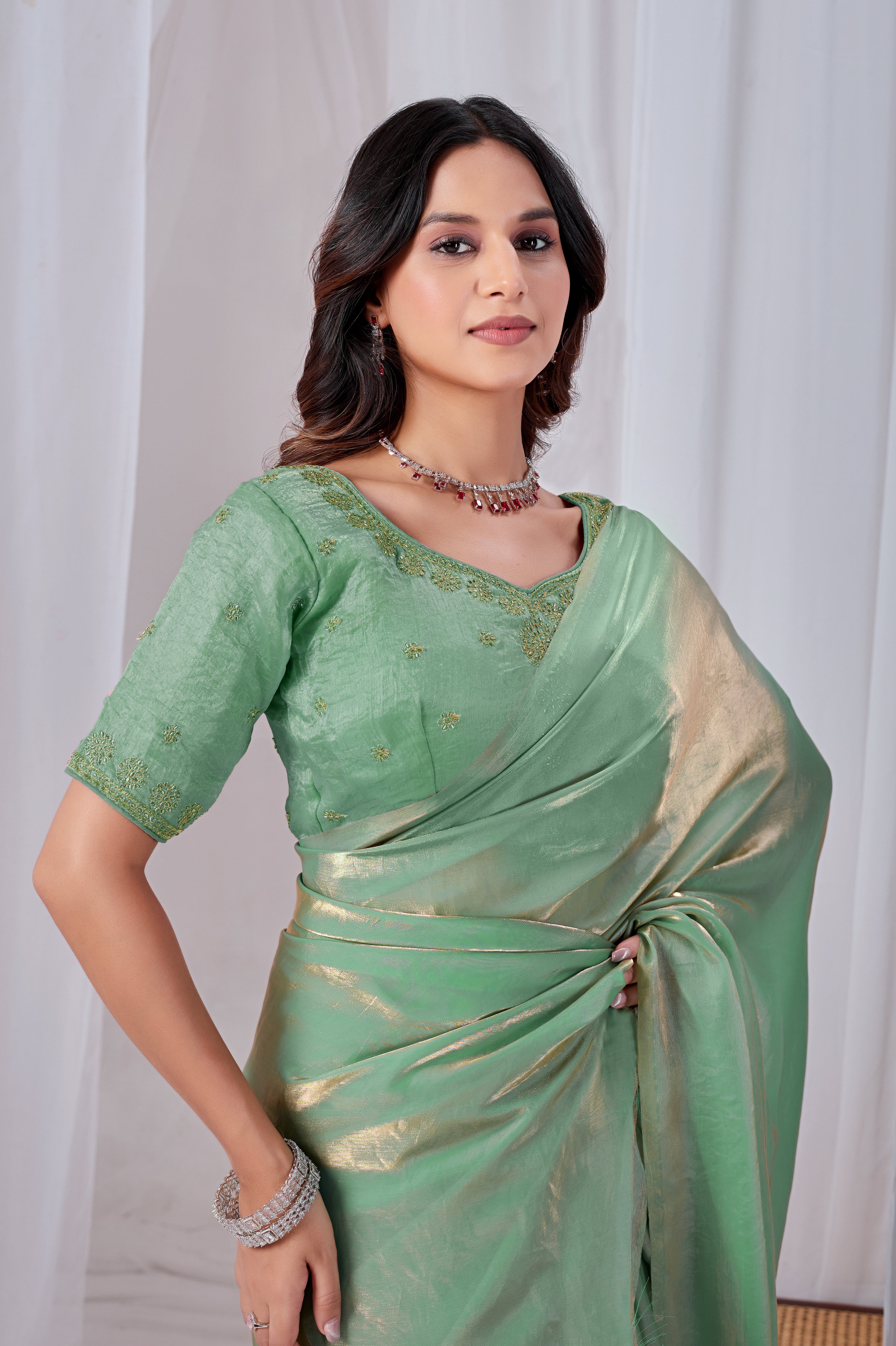 Luminous Rama Green Tissue Silk Saree with Embroidered Blouse
