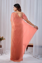 Luminous Peach Tissue Silk Saree with Embroidered Blouse
