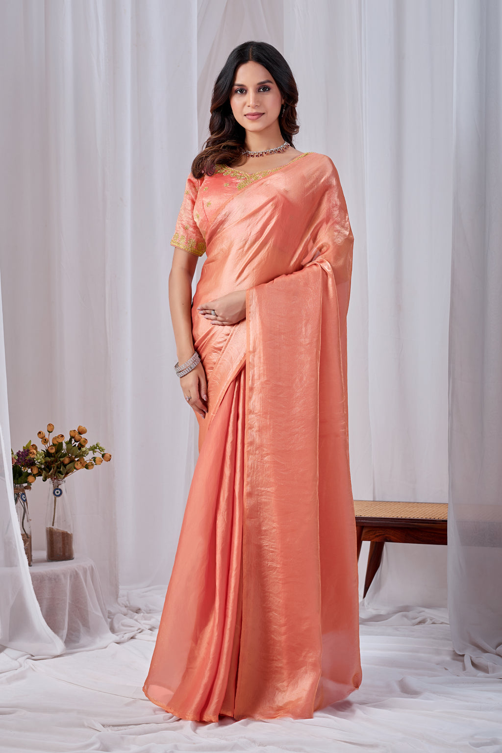 Luminous Peach Tissue Silk Saree with Embroidered Blouse