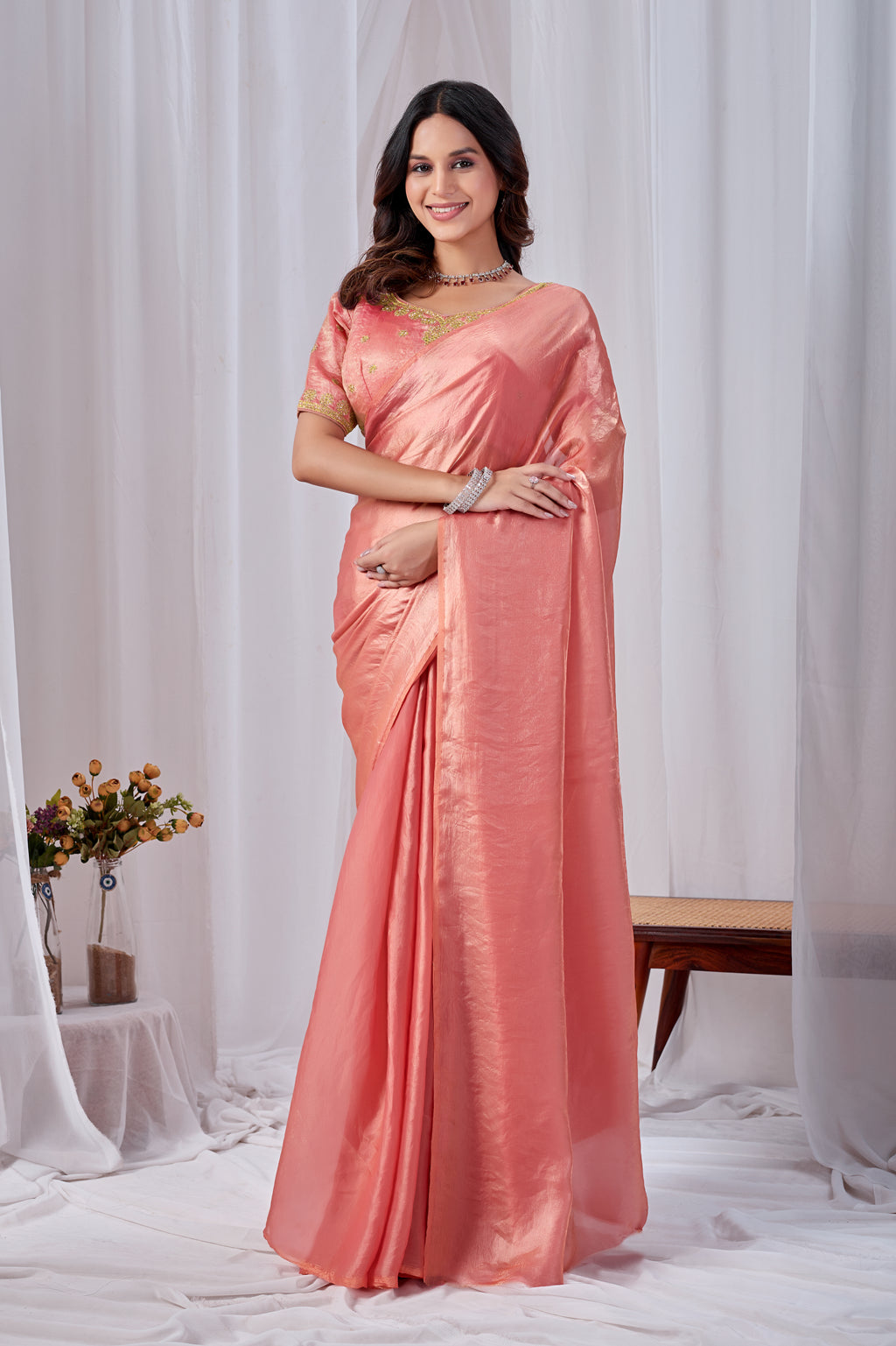 Luminous Peach Tissue Silk Saree with Embroidered Blouse