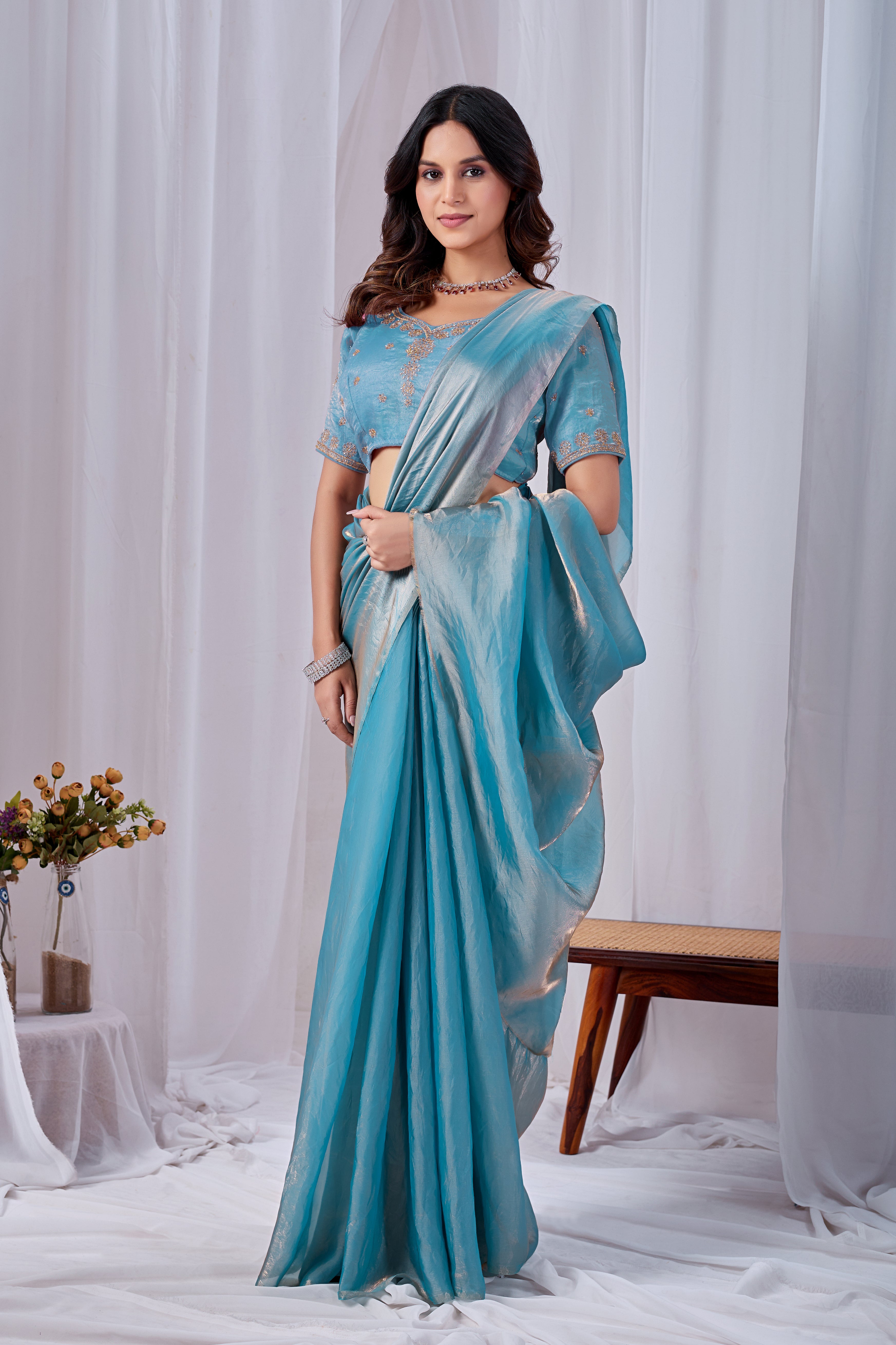 Luminous Rama Blue Tissue Silk Saree with Embroidered Blouse