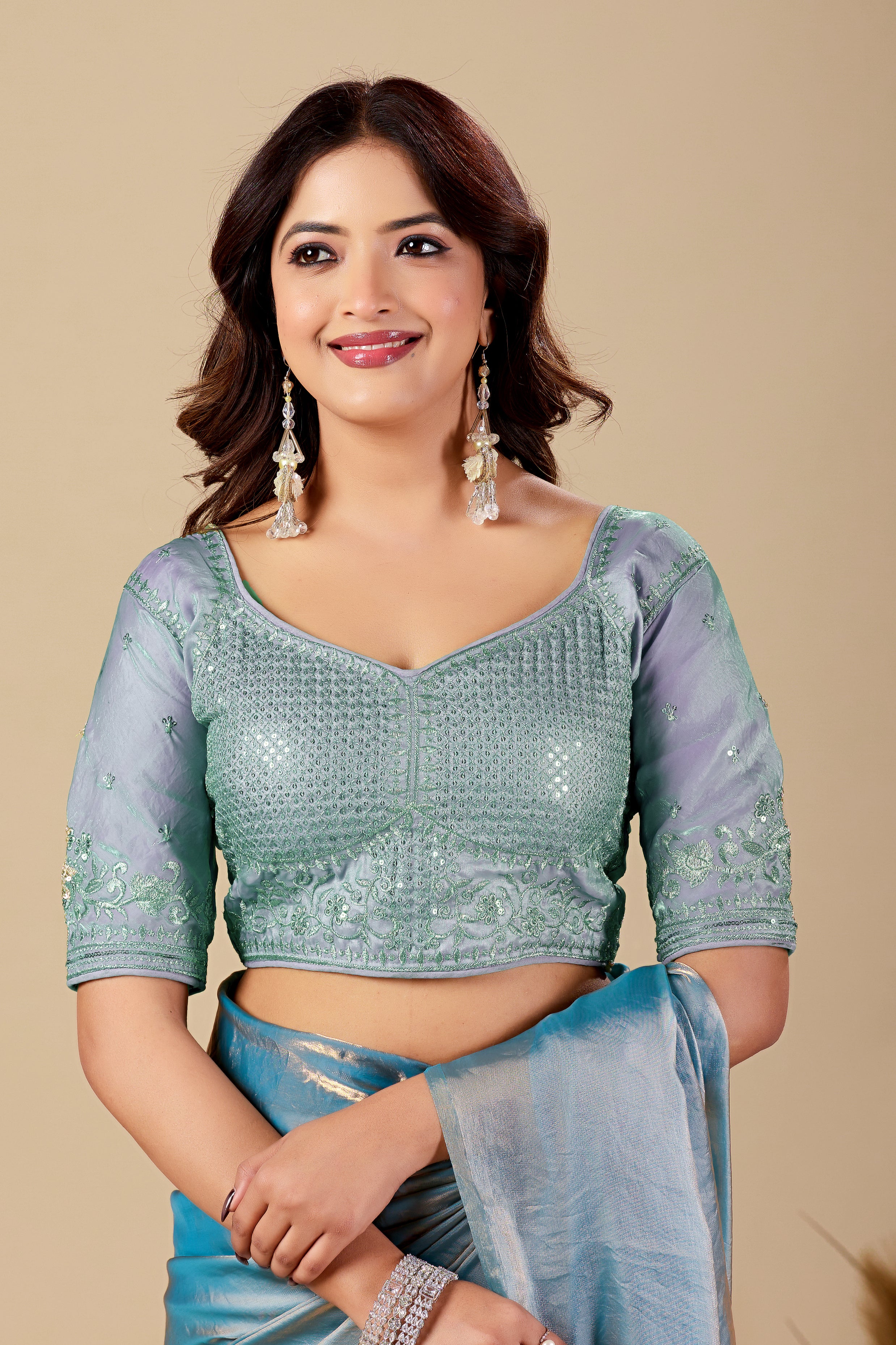 Luminous Rama Blue Tissue Silk Saree with Sequins Embroidered Blouse