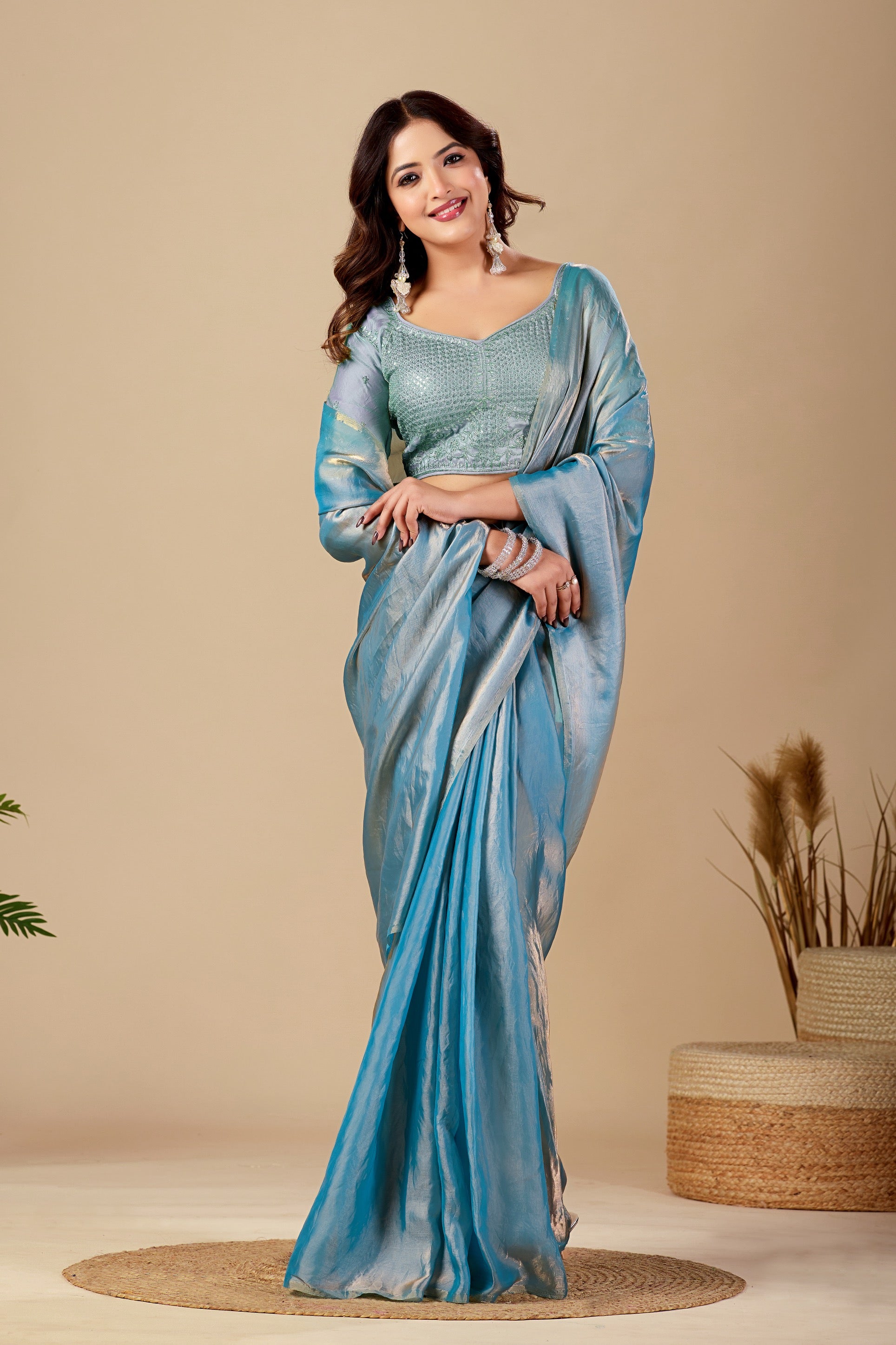 Luminous Rama Blue Tissue Silk Saree with Sequins Embroidered Blouse