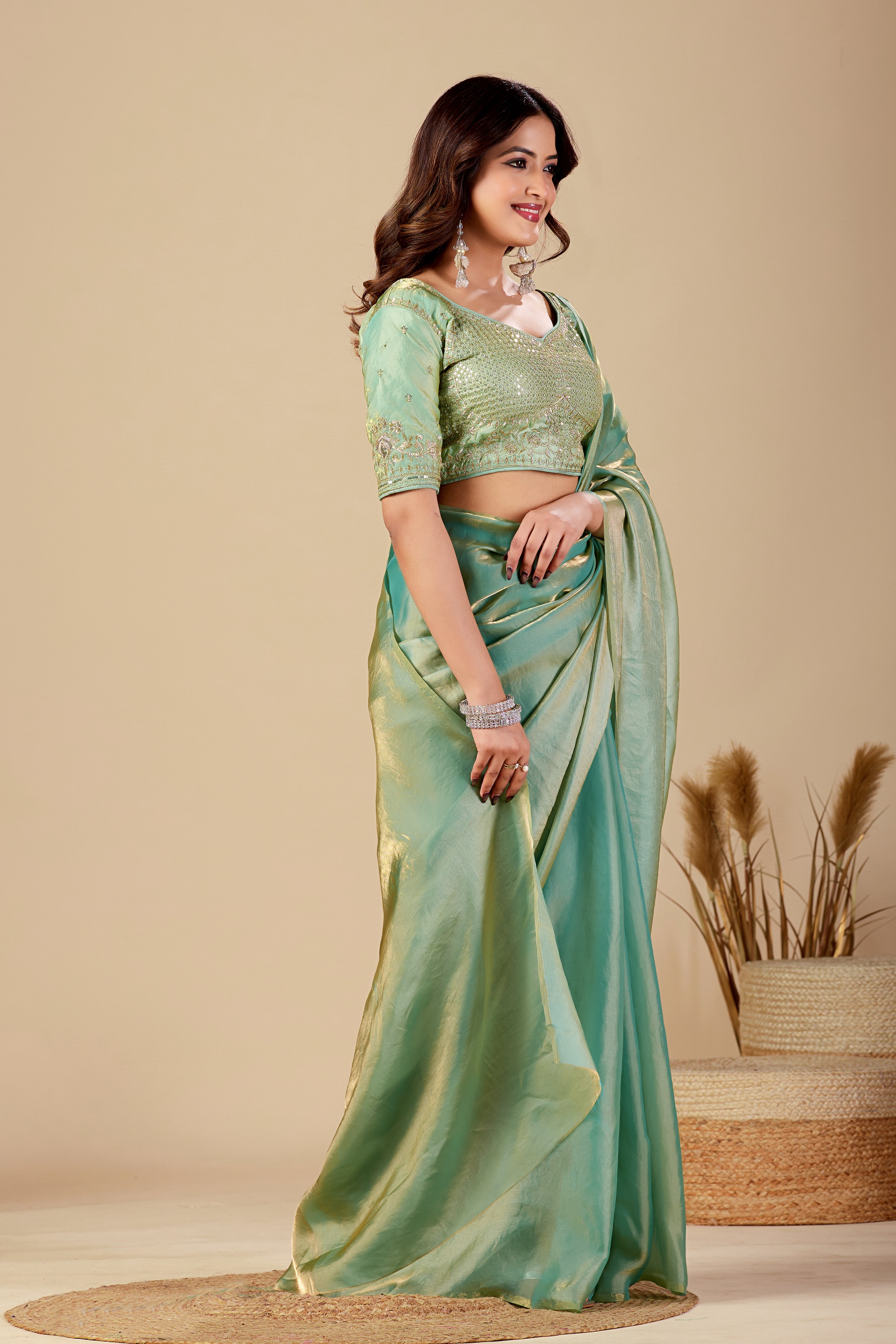 Shimmering Rama Green Tissue Silk Saree with Sequins Embroidered Blouse
