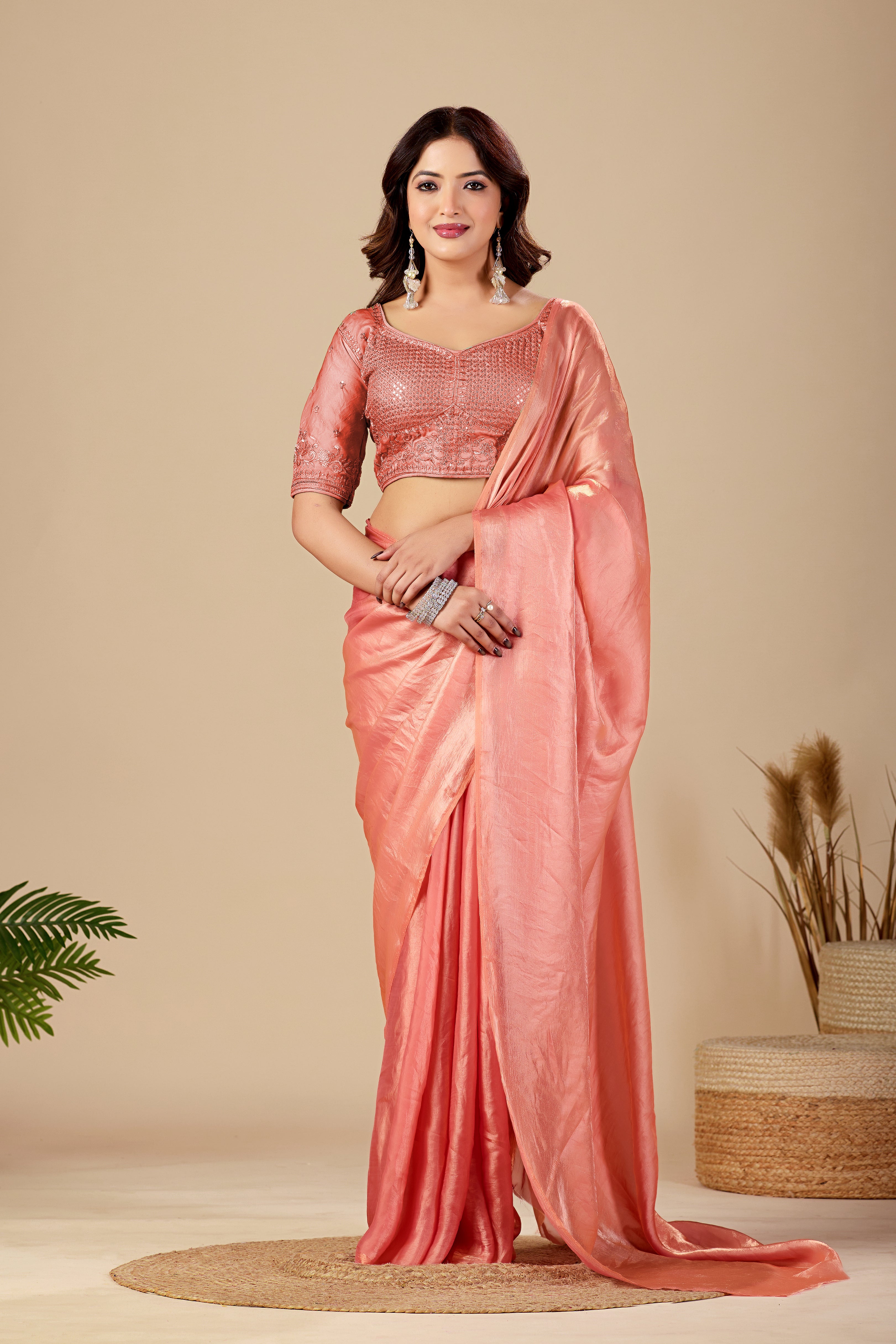 Shimmering Peach Tissue Silk Saree with Sequins Embroidered Blouse
