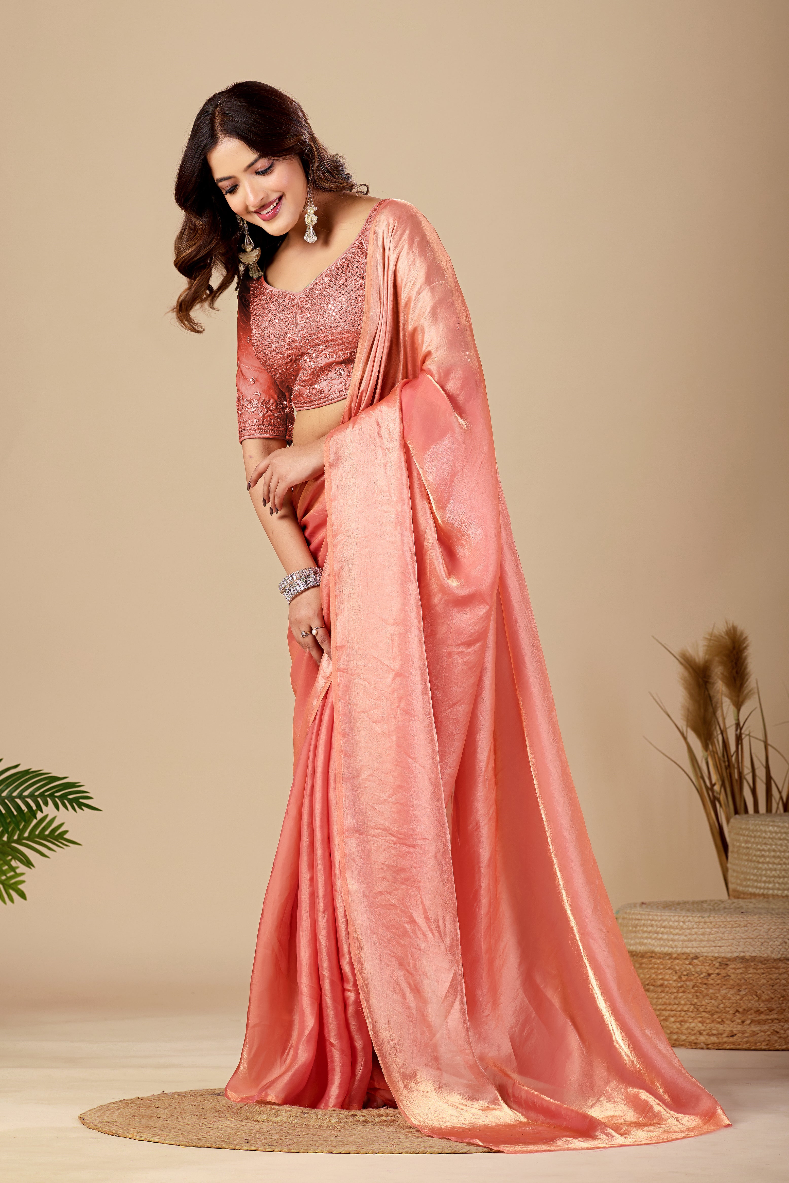 Shimmering Peach Tissue Silk Saree with Sequins Embroidered Blouse