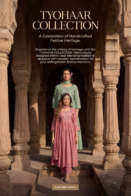 Two women in traditional attire standing in a stone archway with 'Tyohaar Collection' text above.
